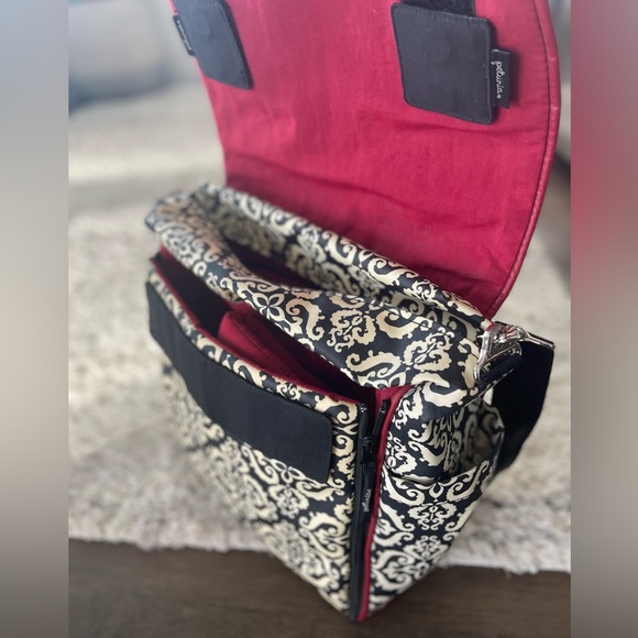 Designer diaper bag with diaper changing pad and backpack straps. - Picture 3 of 5